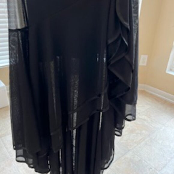 Black formal girls dress with multiple layers of sheer ruffles at the bottom. - Picture 3 of 7